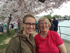 Linda Harlow Cannon graduate 1964 with granddaughter