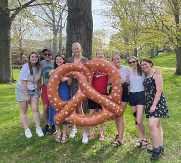Seniors of the class of 2022 celebrating Maifest on the quad